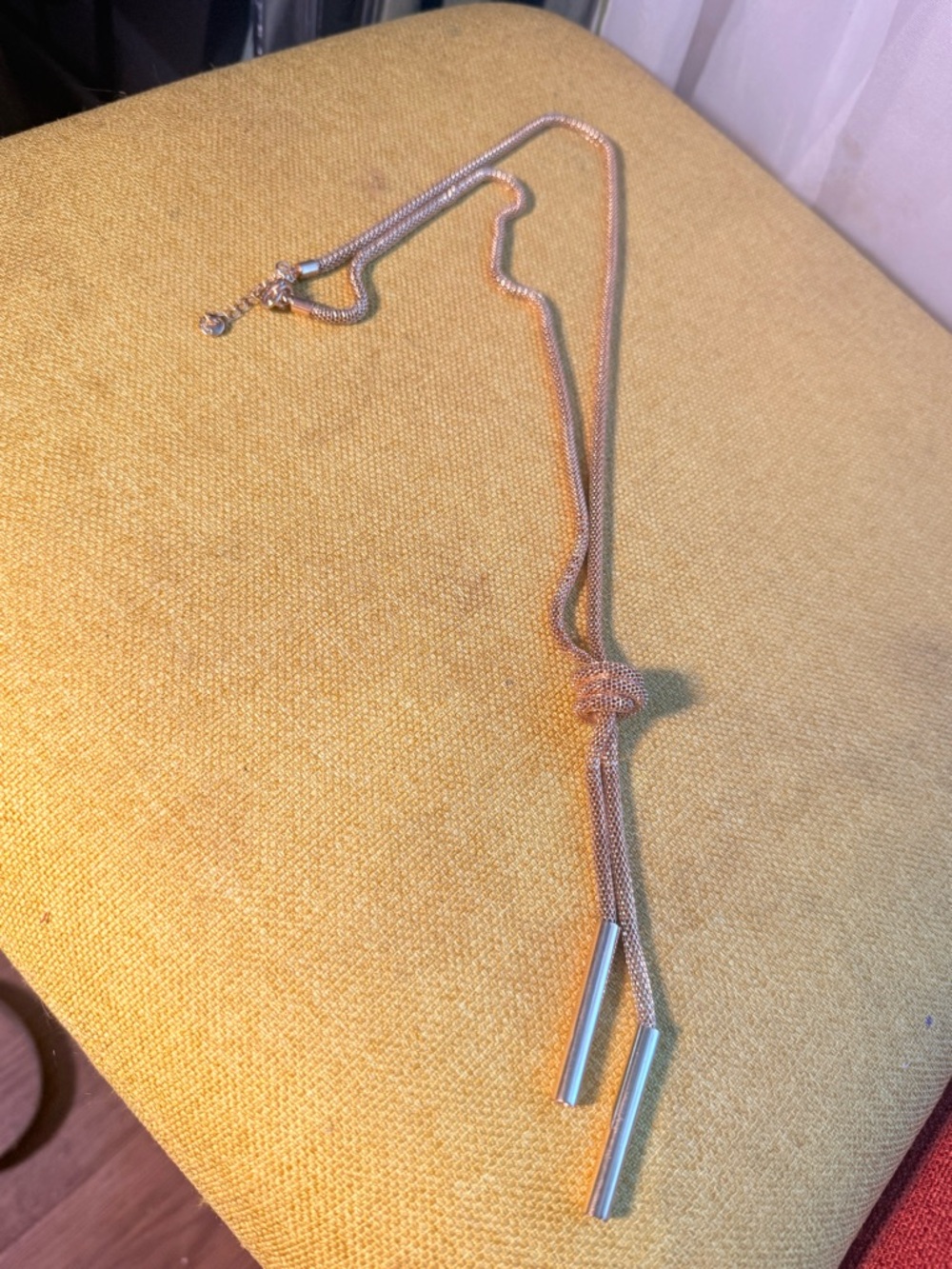 Gold-Tone Knot Lariat Necklace with Tube Tassels after a brand from Barcelona